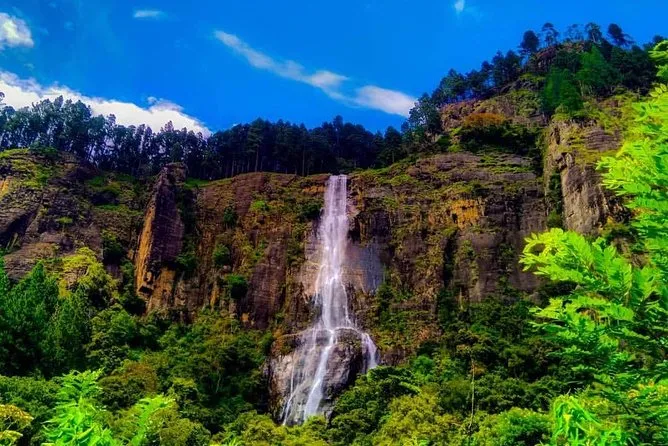 Waterfall cascading through the forest near Ella